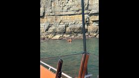 Swanage ILB and ALB on scene near Anvil Point to assist an injured climber.