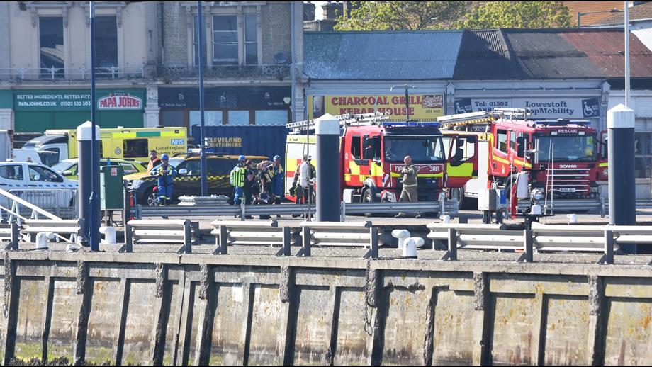 Other emergency services respond to assist the cabin cruiser following an engine fire