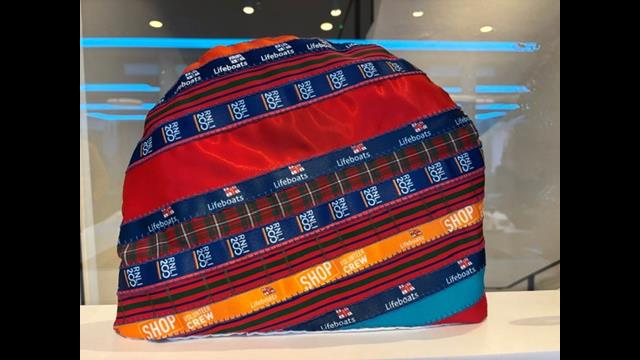 A gift to Roger - a tea cosy made of RNLI lanyards