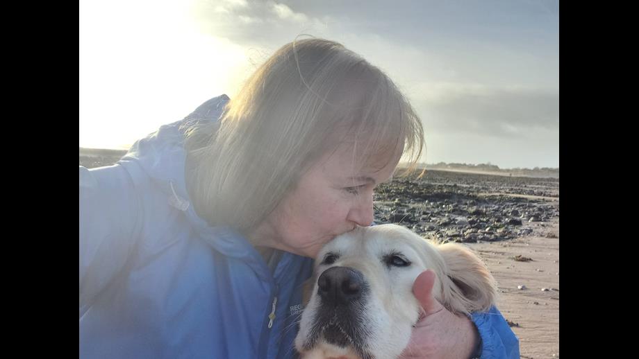 Andrea kissing Seren's head