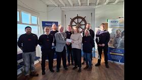 Colin Coe, Chair of Blyth Valley Rotary presents a cheque for £3200 to Lisa Cooper Dann, Chair of Southwold &amp; Dunwich Fundraisers