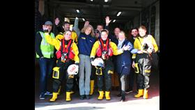 Group photo in front of lifeboat station