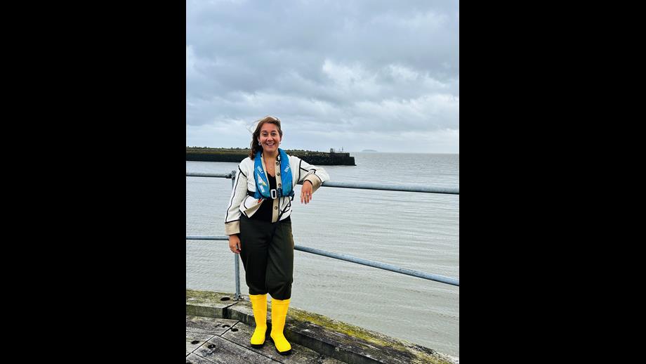 The photo is of Olivia with the breakwater at Barry Dock in the Background
