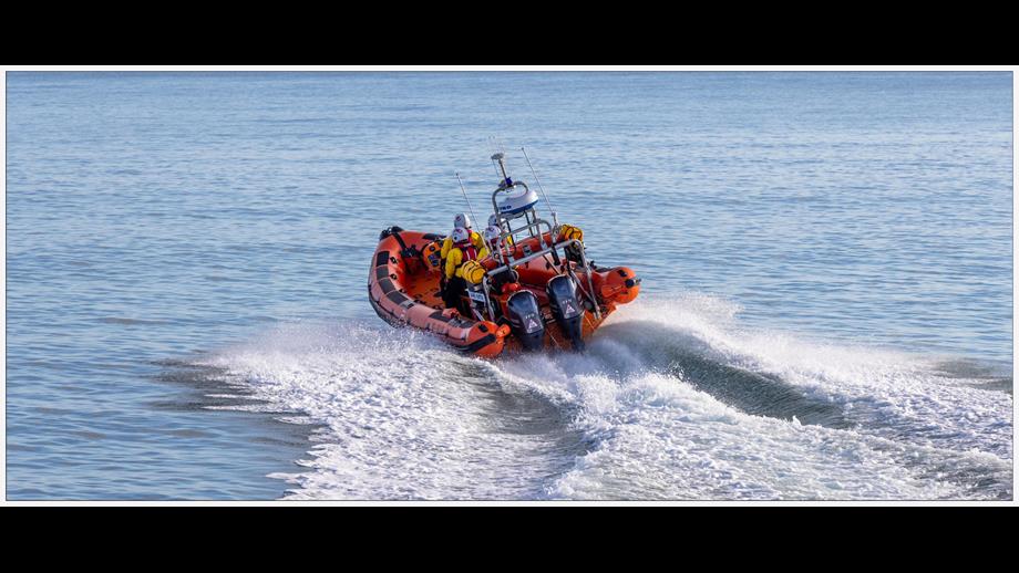 Stonehaven RNLI Atlantic 85 orange rib the Jamie Hunter travelling away