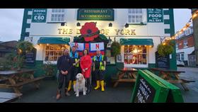 Sally Cass and Cowes RNLI volunteers outside the Duke of York.