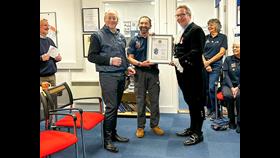 Left to right: Jeremy Dale, Mark Southwell and Graham Bliss, holding the High Sherriff’s Maritime Volunteers Award 2024