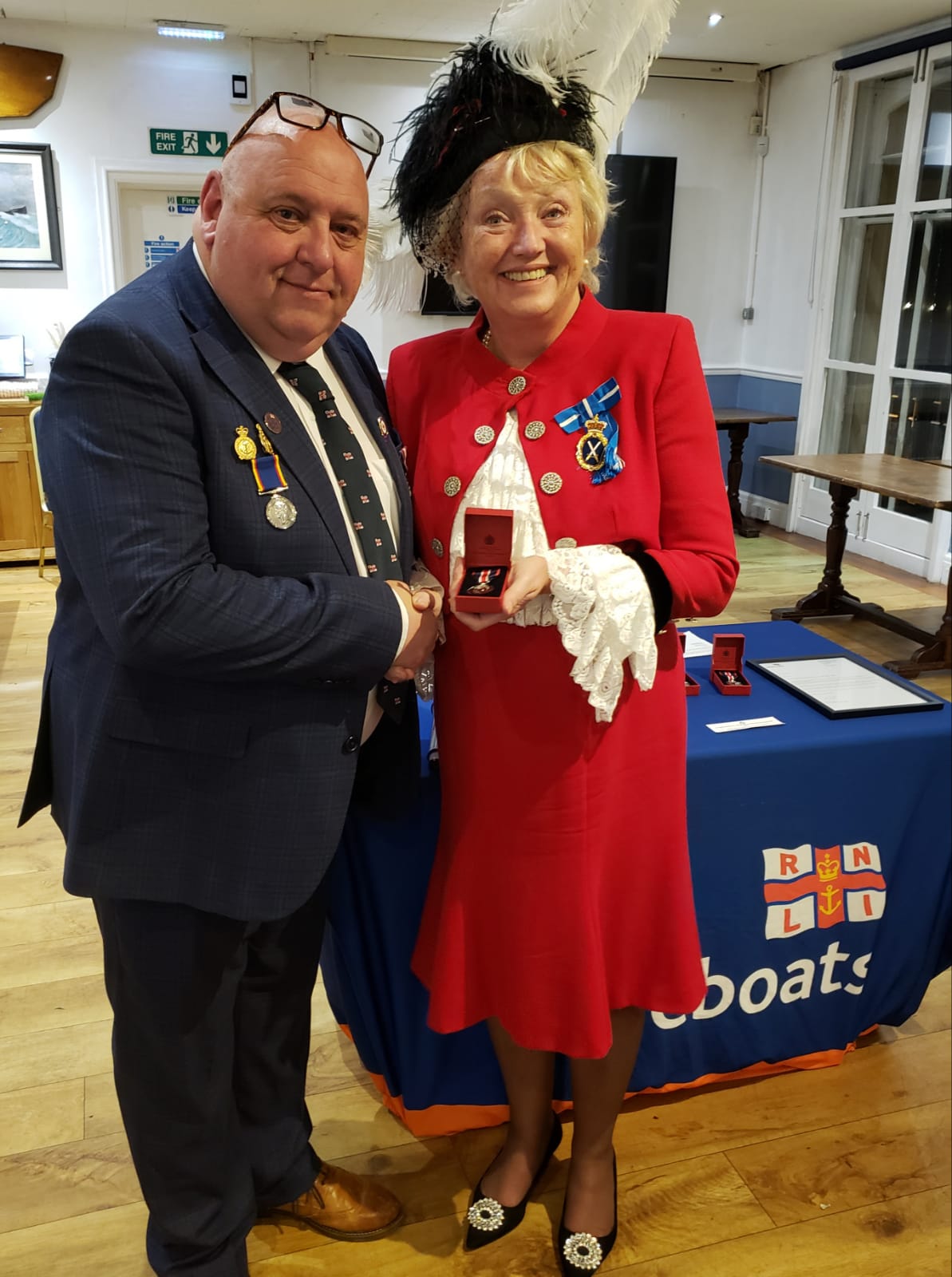 High Sheriff Janey Howell presenting Jason Dunlop with his 30 years of service award.