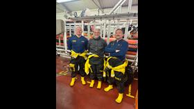 Boat crew Mike Kaczorowski, Assessor.Trainer Lyle, and boat crew Daren Rogers.
