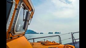 Lerwick lifeboat passing The Needles, Isle of Wight