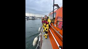 Susan Beaton (front) with crew mate on the Shannon class lifeboat in Poole