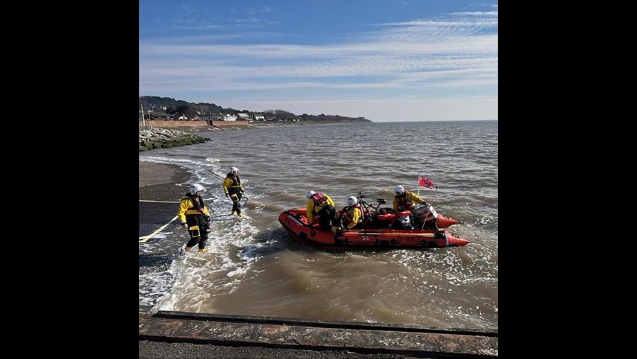 West Kirby Lifeboat crew returning to shore with casualties