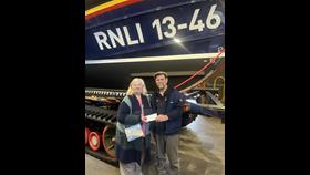 The cheque was presented to Wells RNLI Coxswain, Nicky King, by John’s wife, Sandra Hickling, along with their daughter, Joy, and son-in-law, Mark Collins, on behalf of the ANEMMC. (Association of North East Midland Motor Clubs) in front of Wells RNLI Shannon class lifeboat 