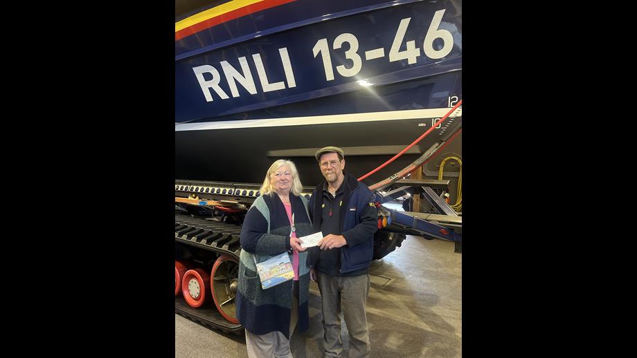 The cheque was presented to Wells RNLI Coxswain, Nicky King, by John’s wife, Sandra Hickling, along with their daughter, Joy, and son-in-law, Mark Collins, on behalf of the ANEMMC. (Association of North East Midland Motor Clubs) in front of Wells RNLI Shannon class lifeboat 