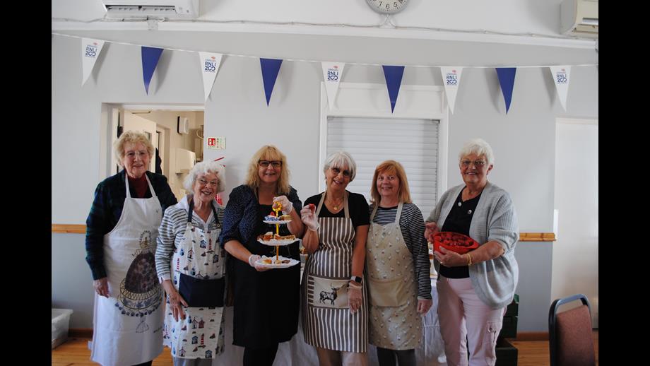 Strawberry tea fundraisers - Myrna and Marion both at the right.