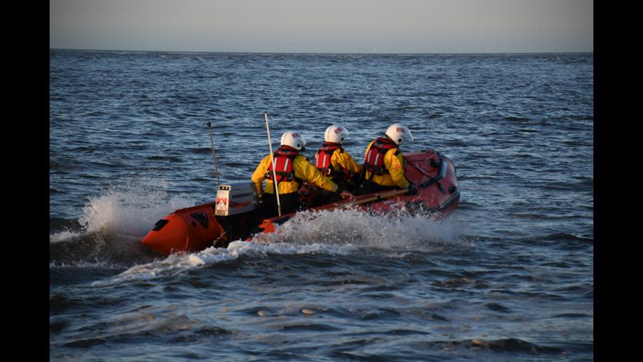 Wells RNLI D class lifeboat on cut off by tide rescue Mothering Sunday