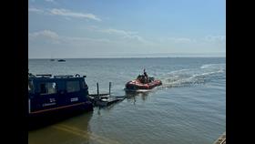The lifeboat can be seen recovering onto the BV launch vehicle on a sunny day