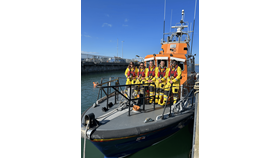 Five RNLI crew members pictured on board the All Weather lifeboat, Anna Livia
