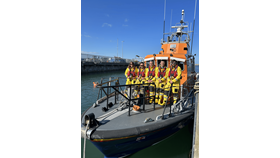 Five RNLI crew members pictured on board the All Weather lifeboat, Anna Livia