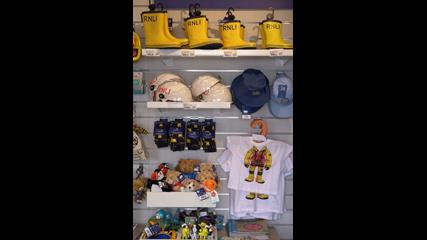 A selection of gifts in the shop including children's wellies, t-shirts and teddy bears
