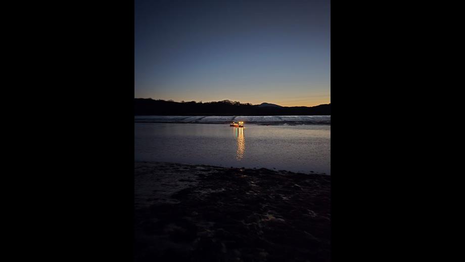 Kippford Lifeboat launches at night time