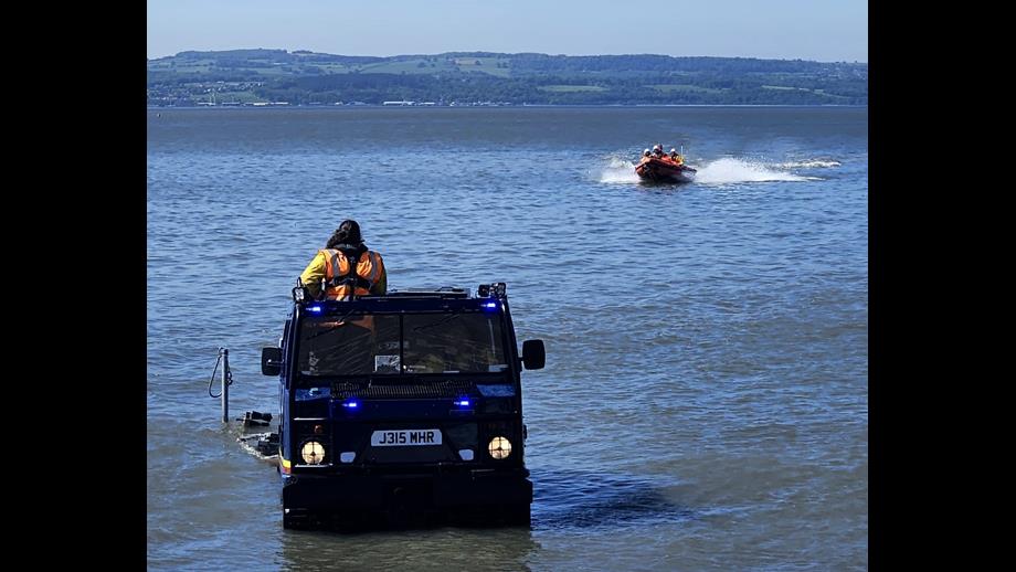 The lifeboat can be seen approaching the BV launch vehicle for recovery in West Kirby