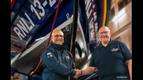 Jake Bennet (left) takes over as Lifeboat Operations Manager from Steve Clarke (right).