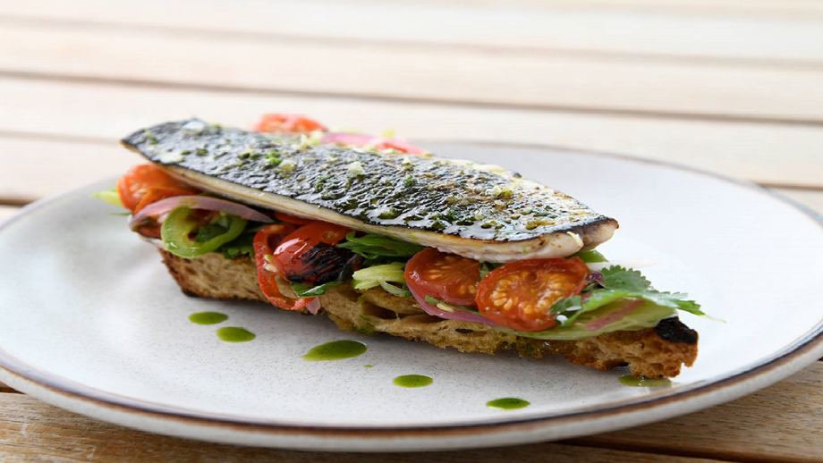Mackerel on toast with tomatoes and coriander 
