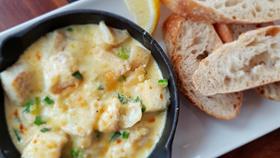 Creamy haddock served with white sourdough bread