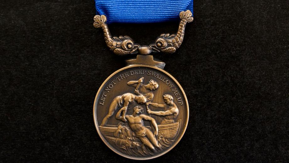 An RNLI Bronze Medal for Gallantry, engraved with the motto: ‘let not the deep swallow me up’, from Psalm 69:15