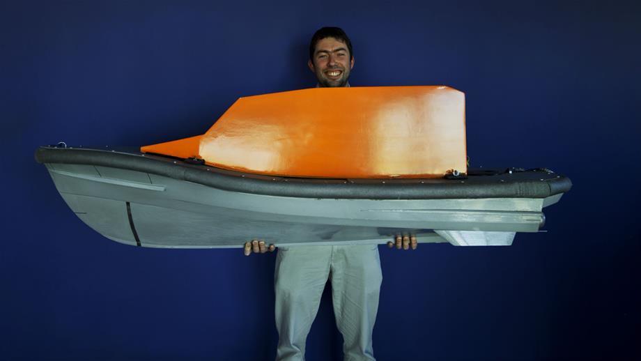 RNLI Naval Architect Peter Eyre with his hull model design for the new Shannon class lifeboat