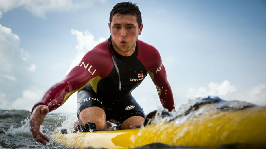 RNLI Lifeguard Richard Evans on a rescue board