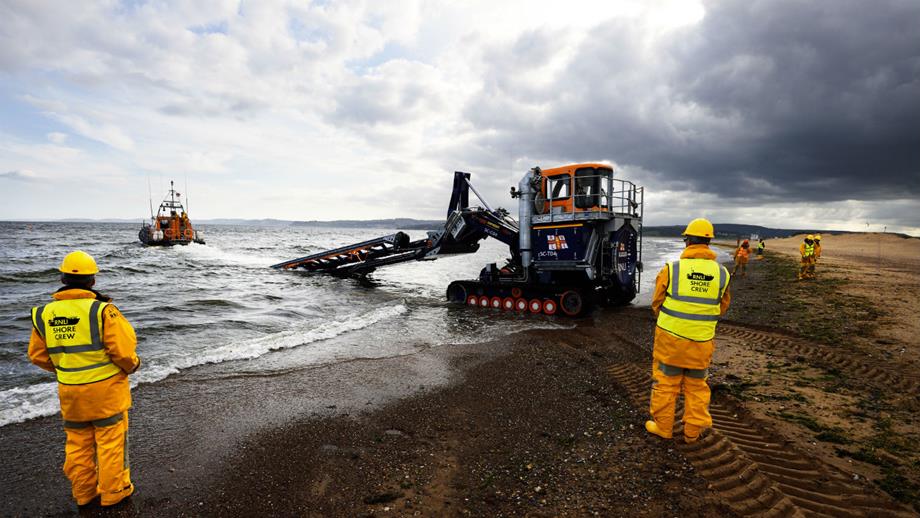 Exmouth RNLI's Shannon class lifeboat, R and J Wellburn, being launched into the sea.