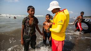 RNLI trained lifeguard patrolling Cox's Bazar beach in Bangladesh