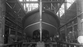Black and white image of Rosslare Harbour lifeboat, K.E.C.F.,on blocks