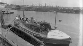 Black and white image of Salcombe lifeboat, Samuel and Marie Parkhouse, moored