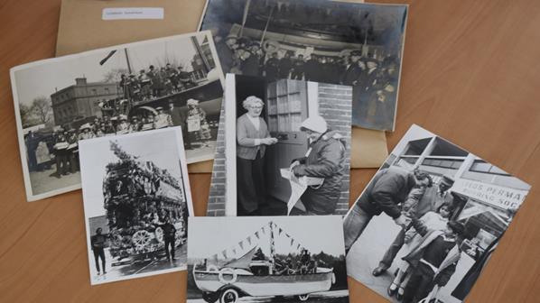 Colour image of a selection of black and white fundraising photographs