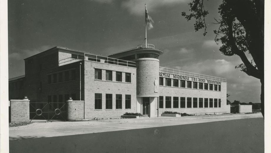 Black and white images of front of Art Deco building