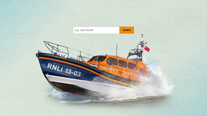 RNLI Exmouth Lifeboat 13-03 crashing through the waves.
