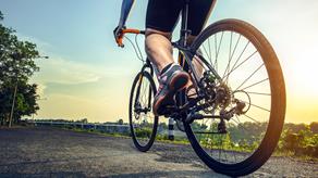 Person cycling on a sunny day