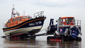 Hoylake’s Shannon class lifeboat, Edmund Hawthorn Micklewood 13-06, being recovered by her launch and recovery tractor, Roland Hough
