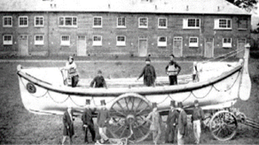 Black & white photo of Torbay's Victorian lifeboat with crew aboard