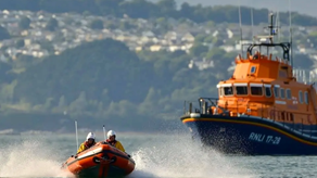 POV photo of Torbay D class lifeboat heading towards camera with Severn class lifeboat in the background