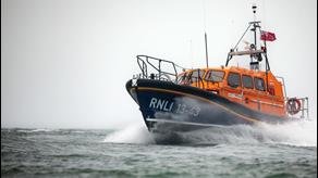 Shannon class lifeboat cruising along the water