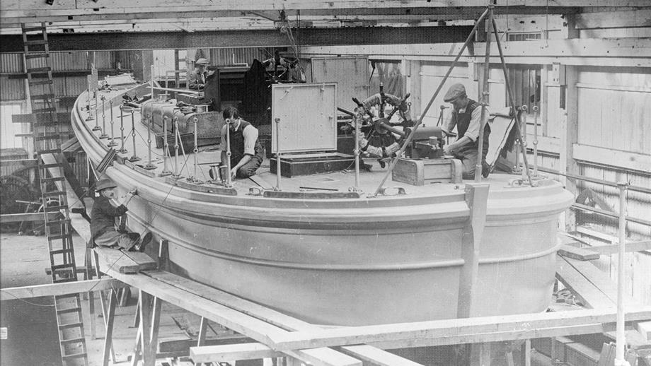 Boatbuilders work on the Sir William Hillary at the boatyard