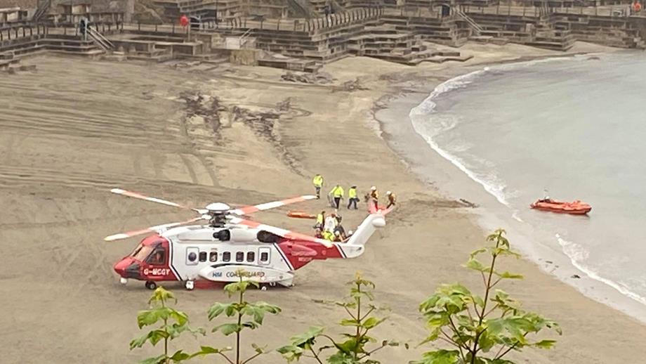 The coastguard helicopter prepares to take Louis to hospital