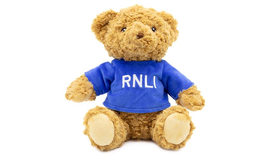 Noah Bear is soft, cuddly and made from recycled plastics. He wears a long-sleeved blue fleece top with ‘RNLI’ embroidered on the front