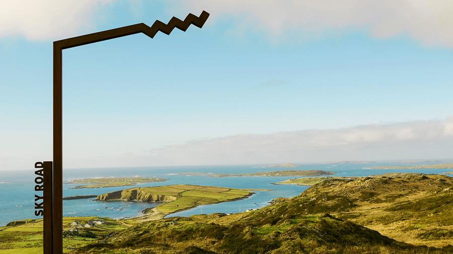 A beautiful coastal view near Clifden with a sign that says, ‘Sky Road’