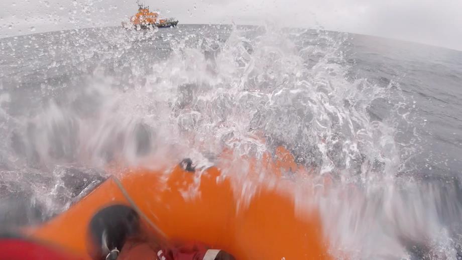 Fraserburgh’s XP boat returns, through choppy water, to the Trent class lifeboat