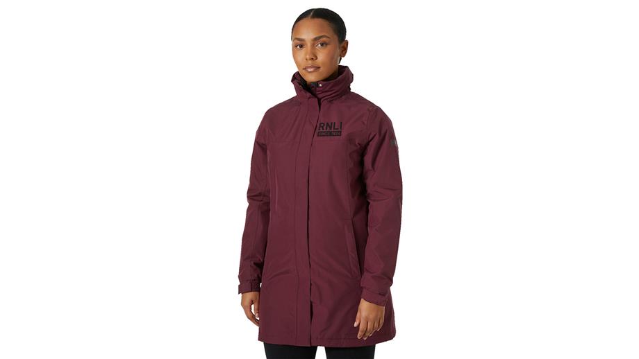 Woman wearing a hickory coloured Helly Hansen Aden jacket, priced £150.