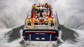 Tenby volunteers onboard Tamar class lifeboat Haydn Miller hit the sea with a splash